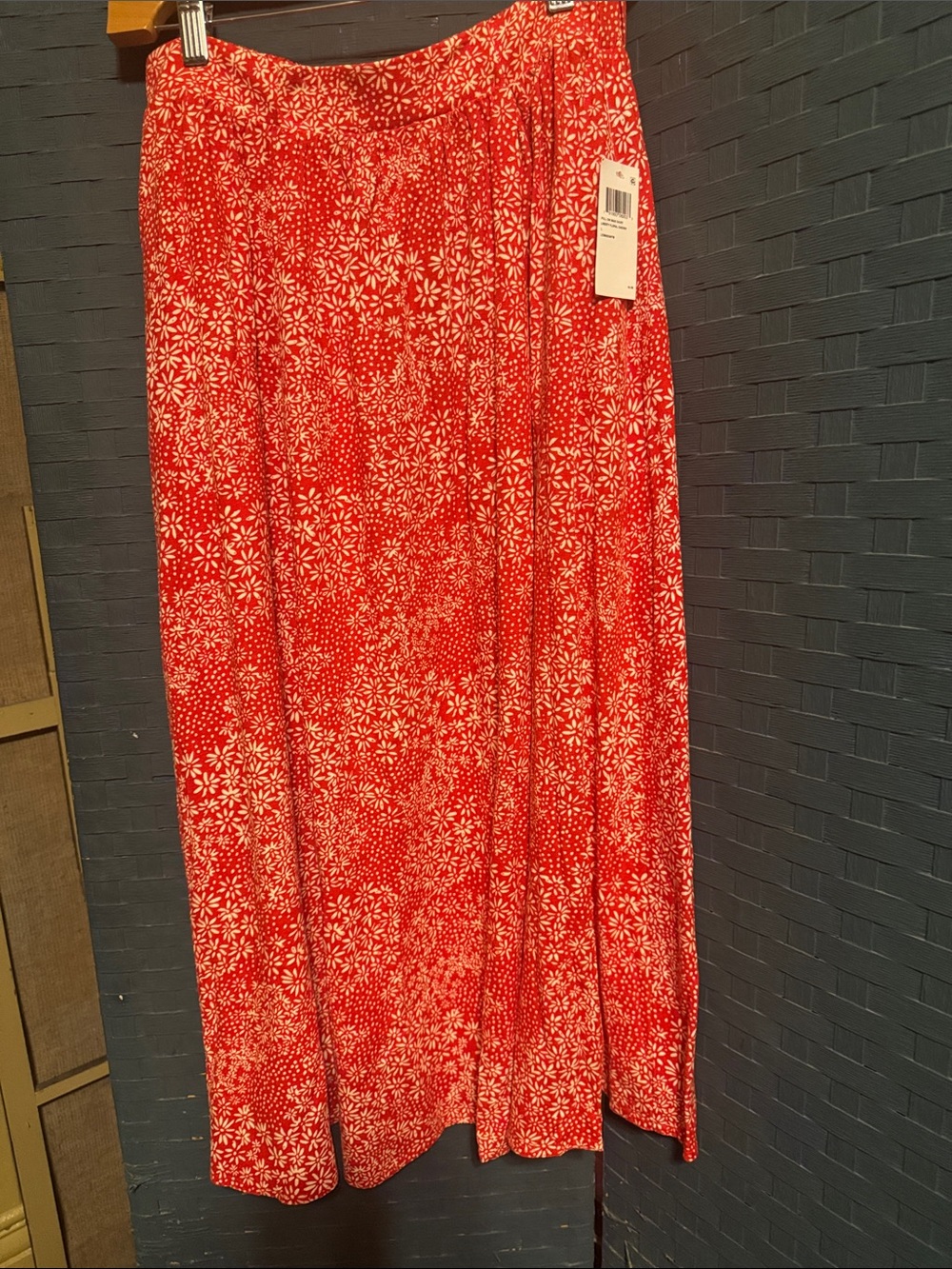 Liberty floral cherry color print. Fits large.